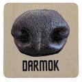 A wooden square panel with a textured picture of a black dog's nose and the name Darmok underneath.